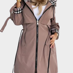 Front view of taupe coat with checked hood