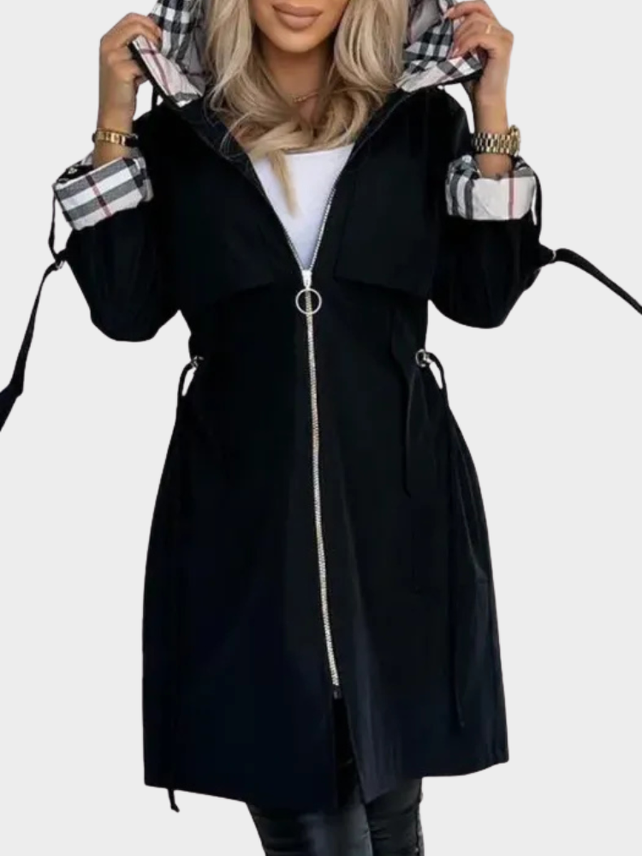 Black coat with front zipper and checked cuffs